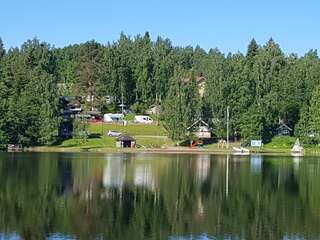 Кемпинги Mansikkaharju Holiday Camp Леппявирта Большой коттедж с видом на озеро-26